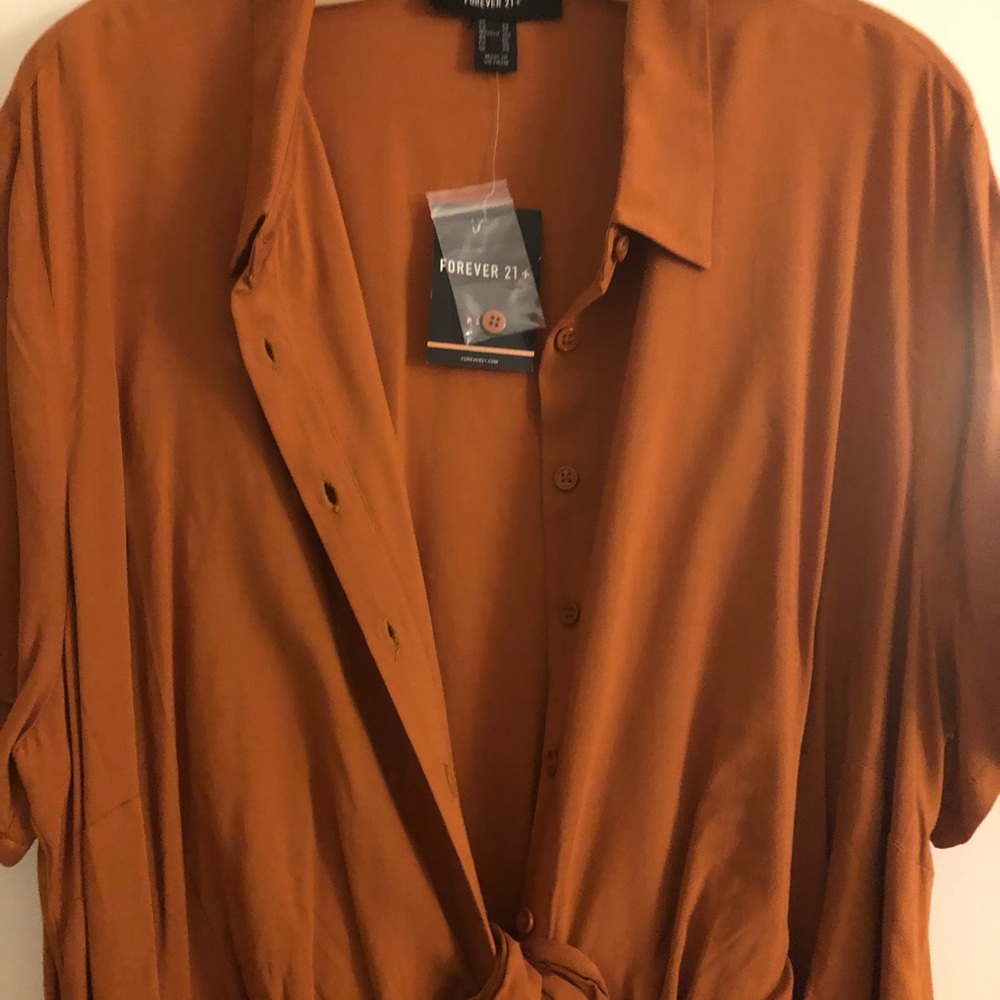 Dress with tie in middle.Lower thigh length.